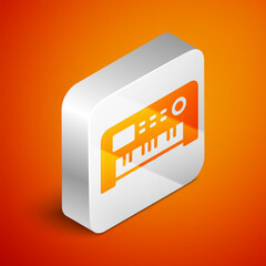 Wall Mural - Isometric Music synthesizer icon isolated on orange background. Electronic piano. Silver square button. Vector