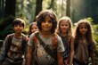 © Georgii - Group portrait of cheerful smiling multiethnic children summer forest. Happy boys and girls of different skin colors play and have fun together outdoors. Diversity and friendship concept.