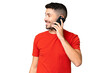 © luismolinero - Young handsome caucasian man over isolated chroma key background keeping a conversation with the mobile phone with someone