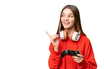 Sticker - Teenager caucasian girl playing with a video game controller over isolated background intending to realizes the solution while lifting a finger up