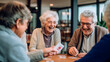 Retired seniors, mix of both men and women, gather in warm space to partake in card games, joying of companionship lively conversations