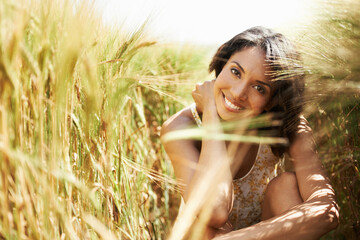 Poster - Portrait, smile and woman in wheat field in the countryside in summer outdoor, beauty and health. Face, happy person at farm and nature, garden and travel on holiday, vacation and relax in Brazil