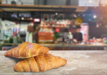 Wall Mural - Beautiful fresh tasty hot croissant on a desk