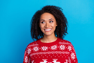 Sticker - Portrait of charming young lady wear red ugly xmas sweater looking smiling empty space black friday gifts isolated on blue color background