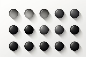 Canvas Print - A group of black buttons on a white surface. This image can be used for various design projects