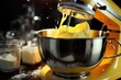 A yellow mixer is pouring batter into a bowl. This image can be used for baking or cooking-related content