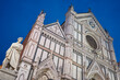 Church of Santa Croce in Florence in the evening with statue of Dante Alighieri at night