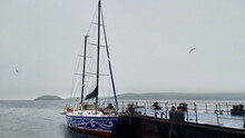 Sailing Yacht At The Pier On Popov Island In Peter The Great Bay Of The Sea Of Japan