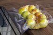Packing fresh pears with a vacuum packer for long-term storage