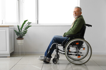 Sticker - Senior man in wheelchair at home