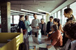 © Davor - Mature businesswoman leading team meeting in office