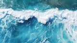 Fototapeta  - Beautiful texture of big power dark ocean waves with white wash. Aerial top view footage of fabulous sea tide on a stormy day. Drone filming breaking surf with foam in Indian ocean. Big swell in Bali.
