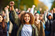Young female student standing in determined solidarity, with a group of people actively protesting in a movement. Concept of fighting for change and embodying Gen Z spirit