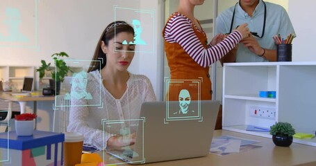 Sticker - Animation of profile icons over caucasian businesswoman working over laptop in office