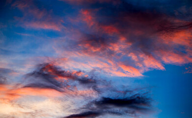 Wall Mural - Colorful dramatic sky with cloud at sunset. Sky background. Cloudscape.