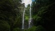 © Wirestock - a waterfall surrounded by lush green trees on a sunny day amazement