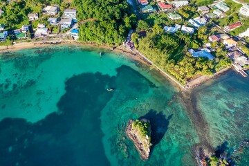 Poster - Scenic view of a small island surrounded by tranquil blue waters