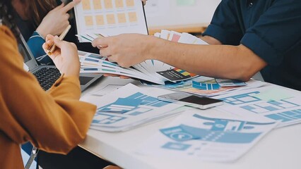 Team of Creative Web Graphic Designer planning, drawing website ux app for mobile phone application and development template layout, process to developing prototype wireframe, User experience concept.