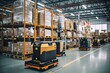 A highly automated warehouse, where AGVs autonomously transport boxes to their destinations