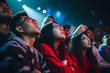 © sam - diverse shot of teens watching esports competition event at gaming conference