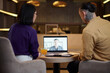 © DragonImages - Business people having online meeting with colleague from another country