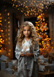 © Julia Zarubina - beautiful little blonde girl in a white dress holds a gift box with a ribbon on a background of garlands and snow, winter, new year, christmas, child, kid, childhood, postcard, present, portrait, face