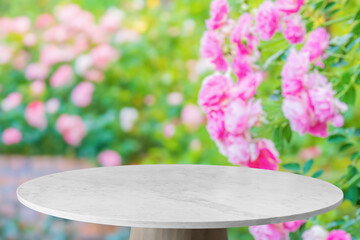 Wall Mural - Empty marble table top with blur rose garden background for product display