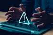 © ภัทรชัย รัตนชัยวงค์ - Hacked system notification Cyber attack on a computer network, warning sign, cyber risk, warning, caution, error, threat, network security danger.
