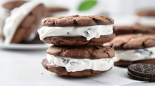 
Sandwich Cookies With Cream On White Table, Close-up.