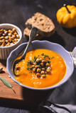 Fototapeta Tulipany - Homemade pumpkin soup with crispy roasted chickpeas	