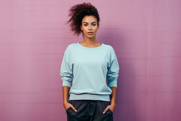 Female top model wearing casual cropped top and trousers