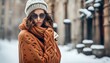 Sensual young model woman posing in outdoor winter scene. Female wearing warm clothes in fashion pose. Autumn winter collection.