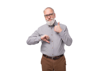 Wall Mural - smart successful mature gray-haired office worker man with mustache and beard dressed in trousers and shirt