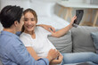 © SpaceOak - Asian couples joyfully watch ultrasounds, revealing baby's health, gender, strengthening family bonds