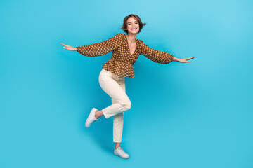 Sticker - Full body photo of overjoyed cheerful lady good mood enjoy dancing partying isolated on blue color background