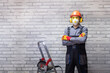 Portrait of worker wearing hardhat and personal protective equiptments. Concept os safety equipment