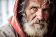 © ADDICTIVE STOCK - Generative AI illustration of elderly bearded man with a wrinkled face and green eyes, wearing a hooded jacket and looking away while standing against blurred background
