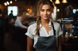 © visoot - Portrait of beautiful female barista at the coffee shop.