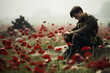 A soldier sitting in a field of poppies remembering those who lost their lives for peace during war