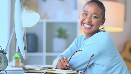 Canvas Print - Happy young business woman working from home. Portrait of a female freelancer removing her glasses while doing research for a project online. Remote worker taking a break after a completed task