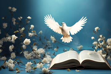 Wall Mural - A dove with outstretched wings over an open Bible in the sunlight