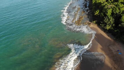 Poster - Guadeloupe sandy beach drone aerial view. Caribbean vacation landscape. Clugny beach (Plage de Clugny).