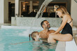 © BGStock72 - Family in the indoor swimming pool