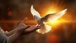 A flying dove in the hand as a symbol of hope
