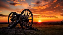 A Pair Of Cannons At Sunset At Antietam National