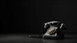 © PaulShlykov - an old telephon with rotary dial on black background