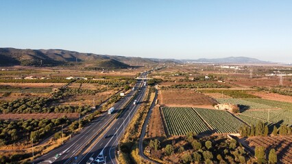 Wall Mural - an empty highway running through the countryside with a lot of land