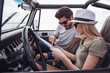 © georgerudy - Couple travelling by car