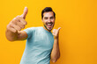 © SHOTPRIME STUDIO - Man portrait studio background gesture style lifestyle copy yellow space trendy smiling arm fashion laughing