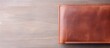 The brown leather wallet was empty isolated from any money or currency as the bull market had taken all
